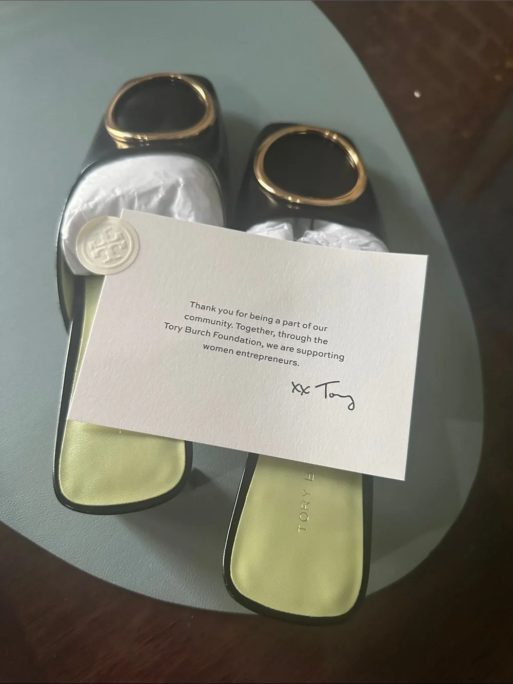 Tory Burch Black Leather Slide Mules with Gold Round Emblem